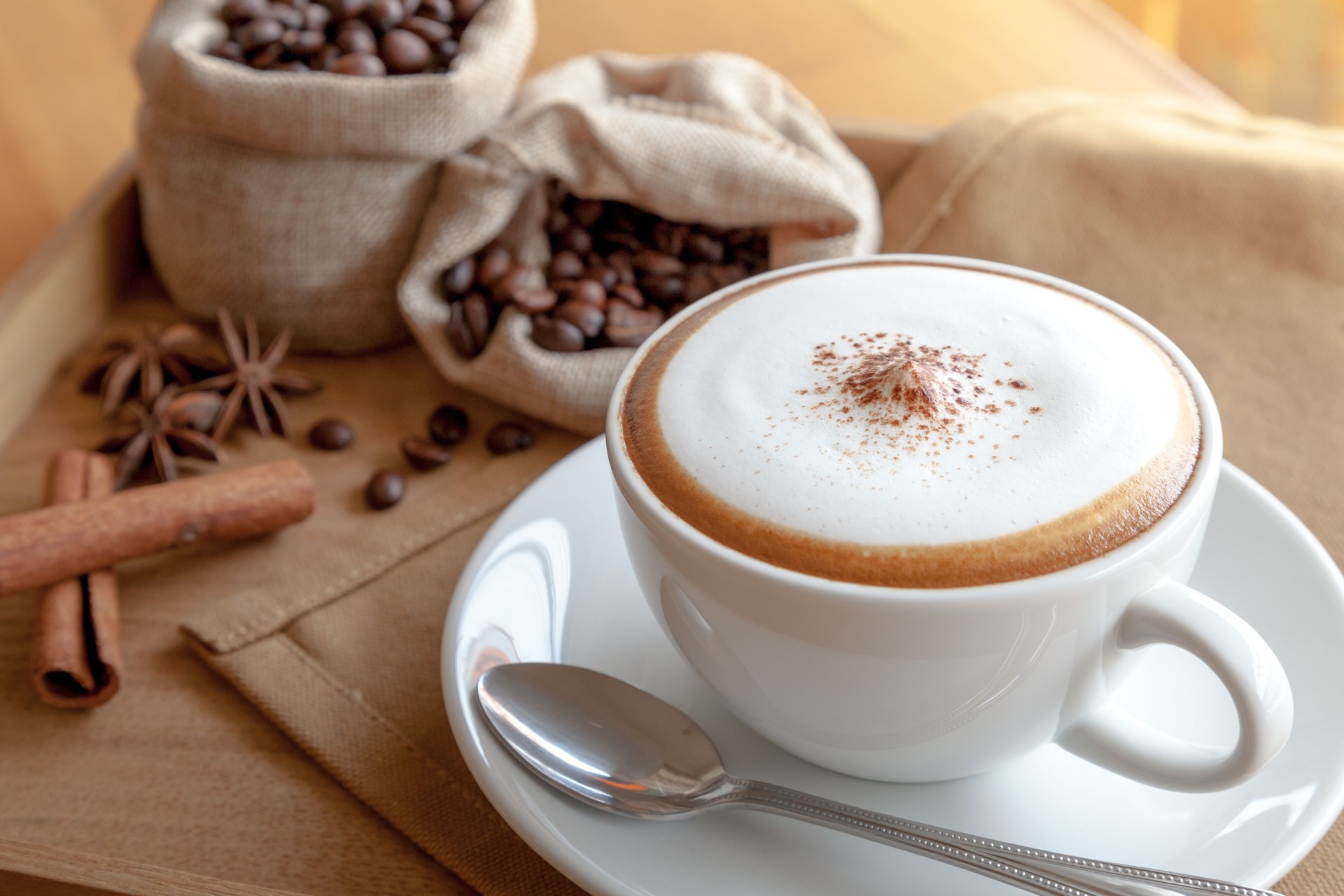 cappuccino with coffee beans